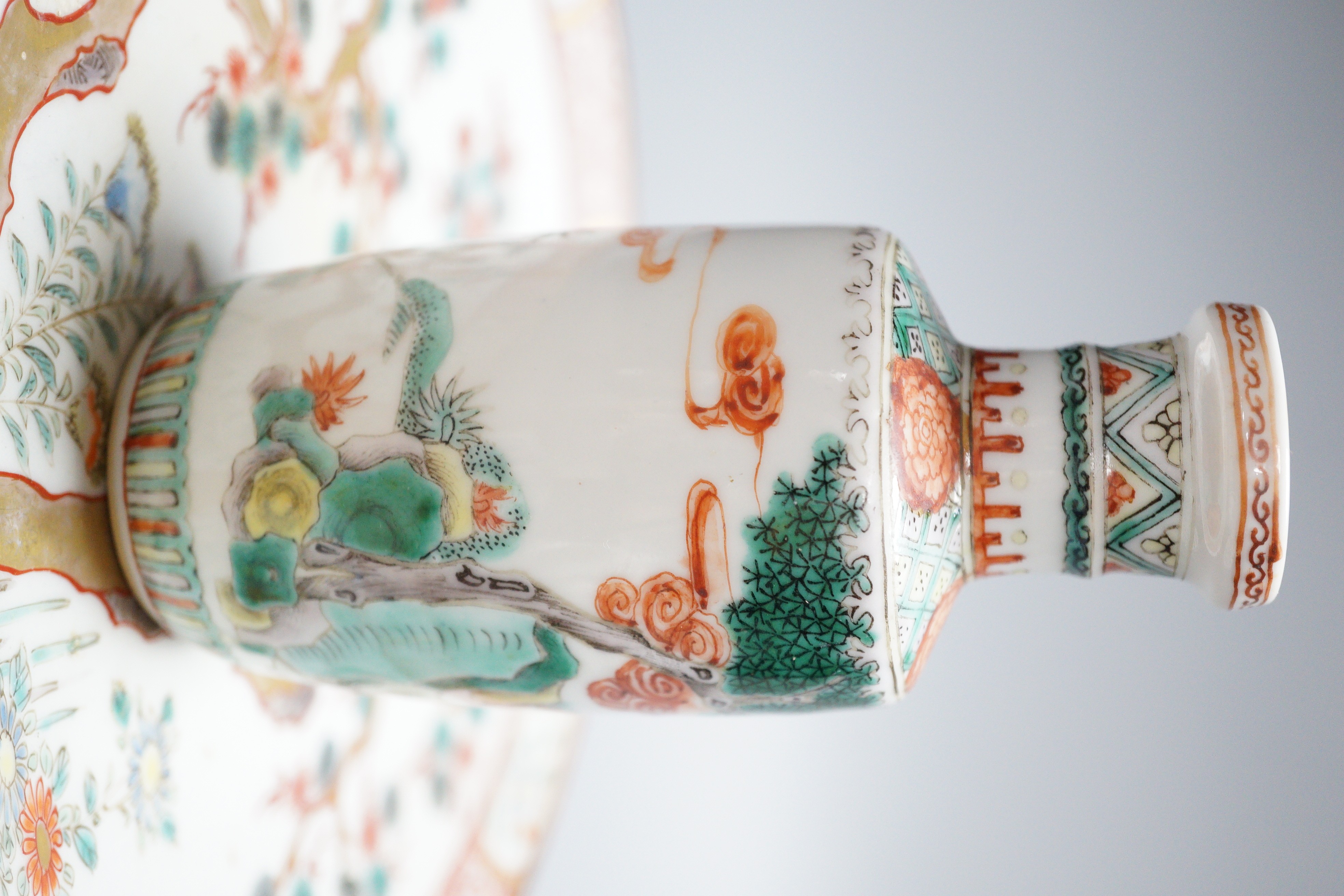 A group of Chinese and Japanese porcelain including an 18th century square Imari dish, a 19th century famille verte vase etc. (6)